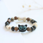 Pulsera de cuentas neko negro ojos azules