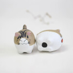 Figura gatito marrón porcelana con distintas caras Frikimall